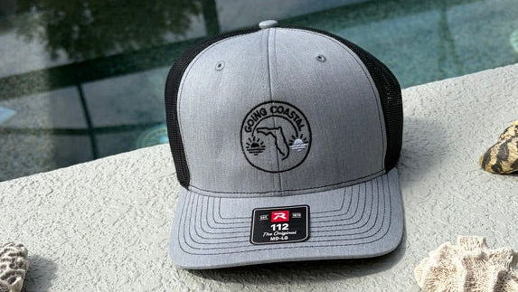 Going Coastal snapback trucker cap by the pool — Florida.